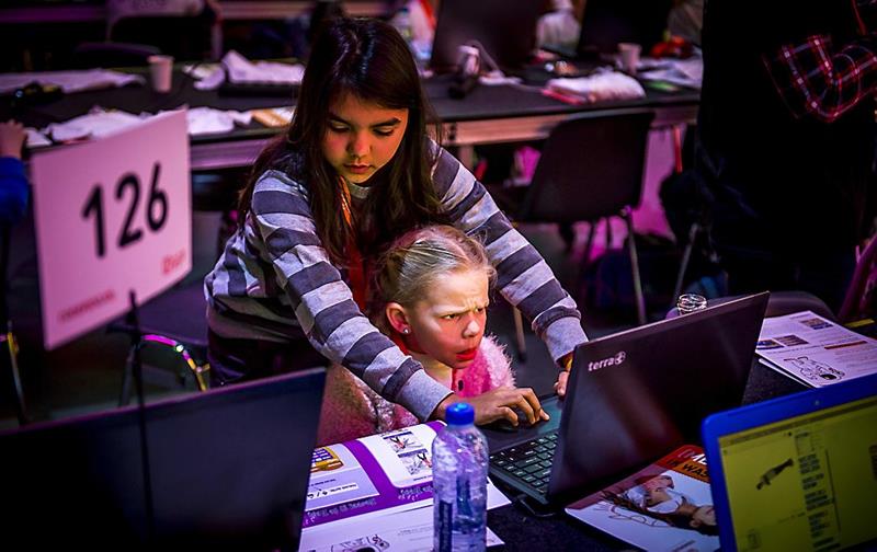 Kinderen leren websites bouwen en apps ontwikkelen (fotoserie)